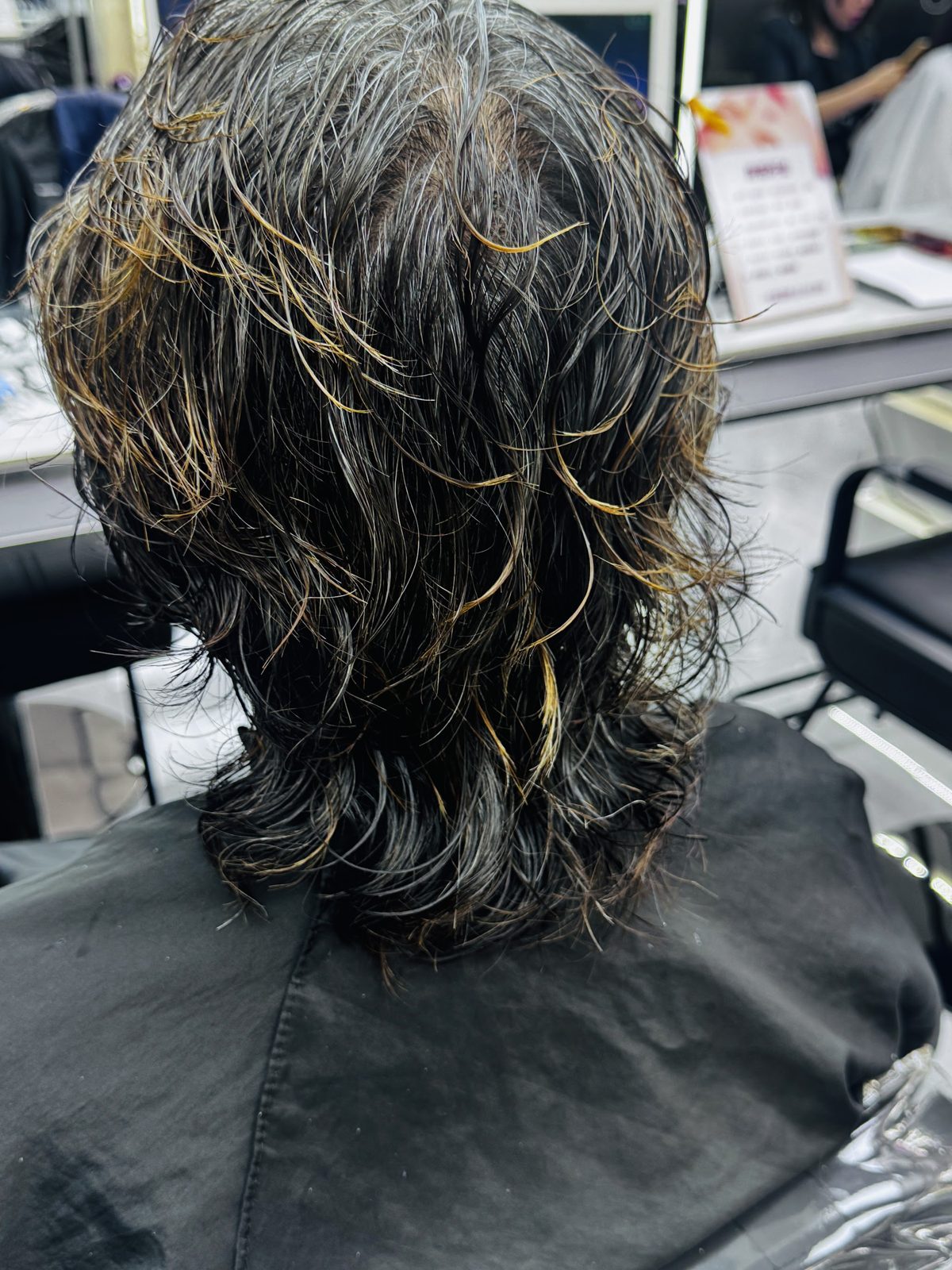 A textured perm with highlights